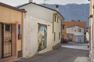 paesaggio campestre con architetture e cervo