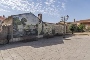 paesaggio fluviale con rovine